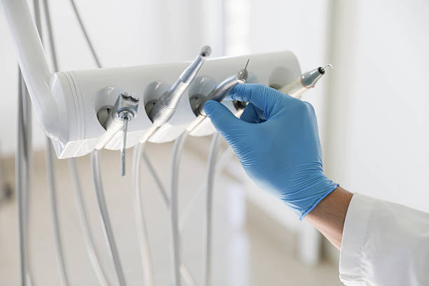 Professional Tooth Extraction technician working in Kernersville, NC